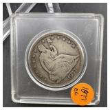 1877-CC Seated Liberty Silver Half Dollar