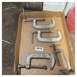 Four 4-inch C-clamps