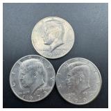 Three Kennedy Half Dollars