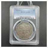 1878-CC Morgan silver dollar, graded AU-53.