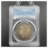 1890-CC Morgan silver dollar, graded Rim Damage.