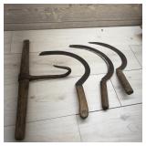 Three Hand Saws And One Hook.