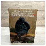 Antique verdigris garden angel.
