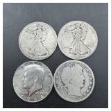Four silver half dollars, including Barber half do