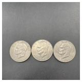 Three $1 Eisenhower Dollars. See Photos For Dates.