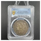 1879-CC Morgan silver dollar, Fine Rim Damage Deta