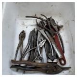 Large lot of specialty pliers and hand tools.