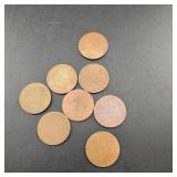 Eight Quarter-Size Blank Planchets
