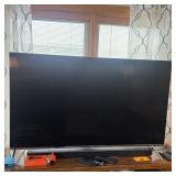 Samsung 55" Tv W/ Soundbar, Roku & Remote