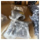 Assorted cast iron fittings in various sizes. See