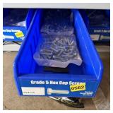 Bolt bin containing assorted hardware and bolts/Mi
