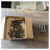 Bag of 1/2-inch x 3-inch threaded rod. See photos.