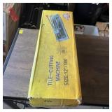 12-inch tile cutting machine. See photos.