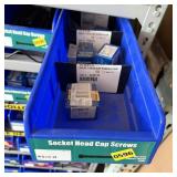 Bolt bin containing assorted hardware and bolts/Mi