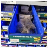 Bolt bin containing assorted hardware and bolts/Mi