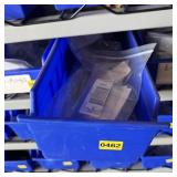 Bolt bin containing assorted hardware and bolts/Mi