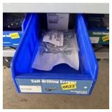Bolt bin containing assorted hardware and bolts/Mi