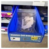 Bolt bin containing assorted hardware and bolts/Mi