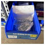 Bolt bin containing assorted hardware and bolts/Mi