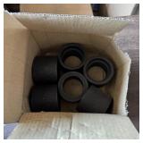 Metal bushings approximately 3 inches in size. See