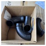 Two-inch PVC elbows. See photos.