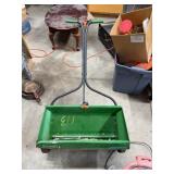 Scotts Green Seed Spreader with Orange Wheels