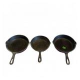 Three Cast Iron Skillets No. 6 and 8