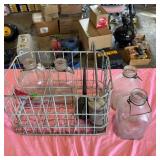 Wire Milk Crate With Glass Bottles and Oil Cans
