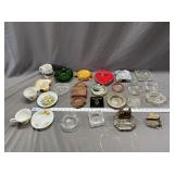 Assorted vintage ash trays and mug