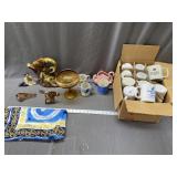 Assorted ceramic mugs, scarf, figurines