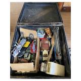 Case with cast iron toys