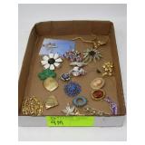 various brooches and pins