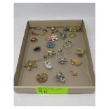 various brooches and pins