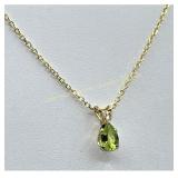 10K Yellow gold peridot & white topaz pendant