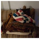Pile of Blankets & Pillows