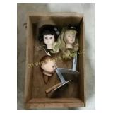 Crate w/doll heads and stands
