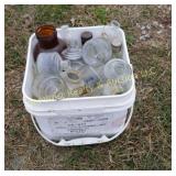Bucket of Glass Bottles