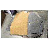 Pile of Rugs & Carpet Squares