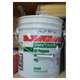 Bucket of Paint Rollers