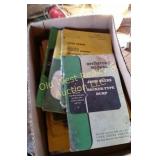 Box of John Deere Manuals