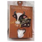 Cow plastic bag dispenser & Items