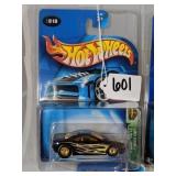 601	LC	57009 010 10/12 Muscle Tone Black Gold and