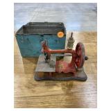 Toy sewing machine with metal box