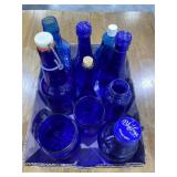 Flat of blue glass bottles