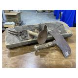 Wooden trough and primitive tools