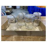 (4)  small Ball jars with glass lids