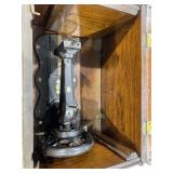 Antique sewing machine in wooden cabinet, sewing
