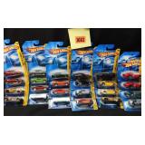24 Hot Wheels 2007 editions: Dodge Ram 1500, '69