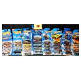 33 Hot Wheels: GMC Motorhome, '67 Pontiac GTO,