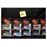 10 Hot Wheels collectibles with display cases: